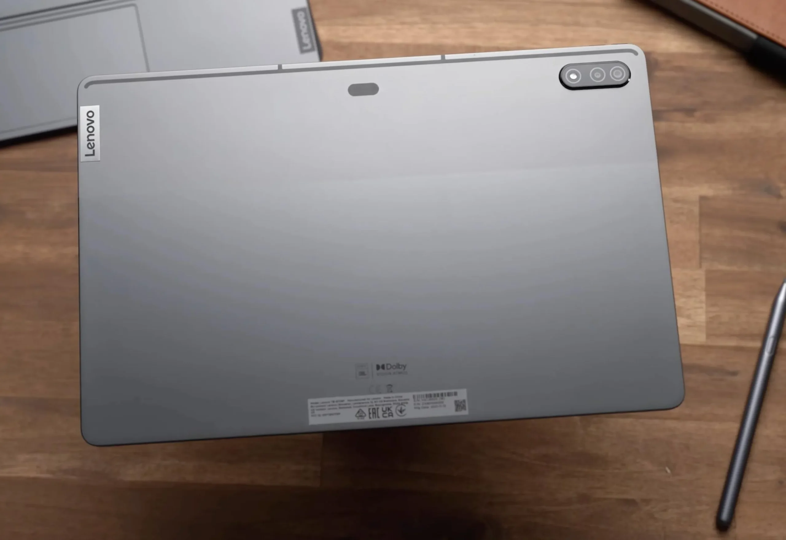 Lenovo Tab P12 Pro 12.6-inch tablet, rear view showing the Precision Pen 3 attached magnetically