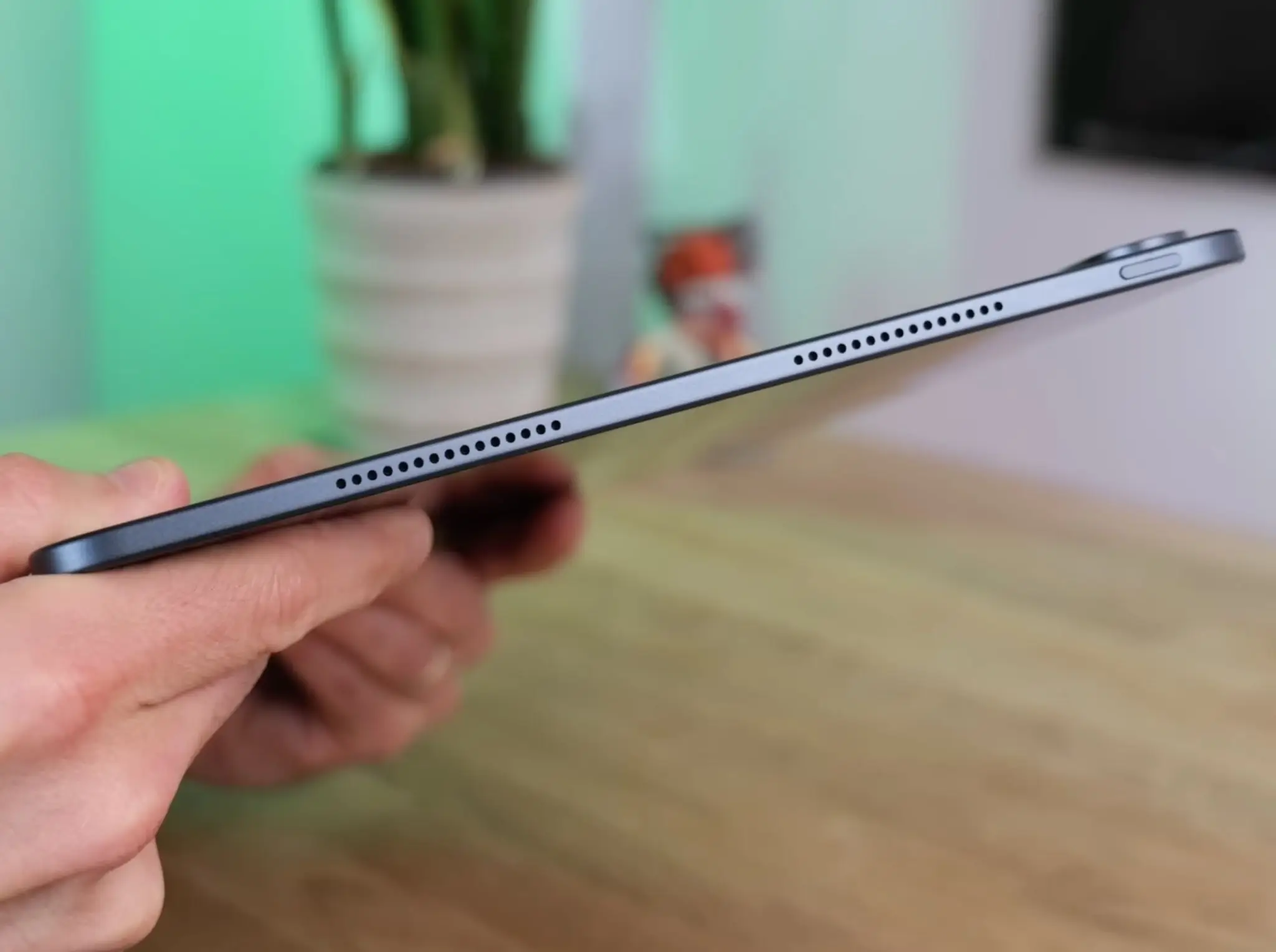 Side profile of the OnePlus Pad 3 showing its 5.97mm thickness and protruding camera module