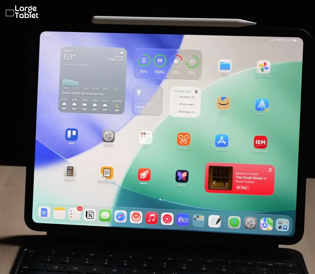 Apple iPad Pro 13-inch (M5) at an angle on a desk, showing its 5.1mm profile