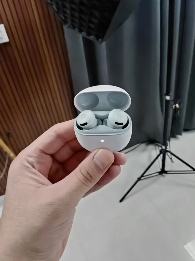 OnePlus Pad 3 Review (After Long Term Test) Photo of wireless earbuds in a charging case taken with the OnePlus Pad 3 rear camera