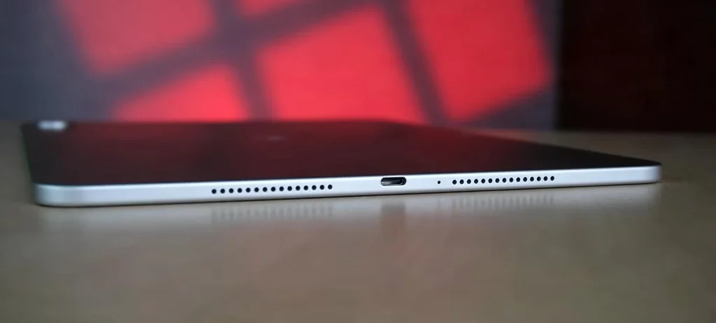 OnePlus Pad 3 Review (After Long Term Test) OnePlus Pad 3 side profile showing the USB-C port and speaker grilles